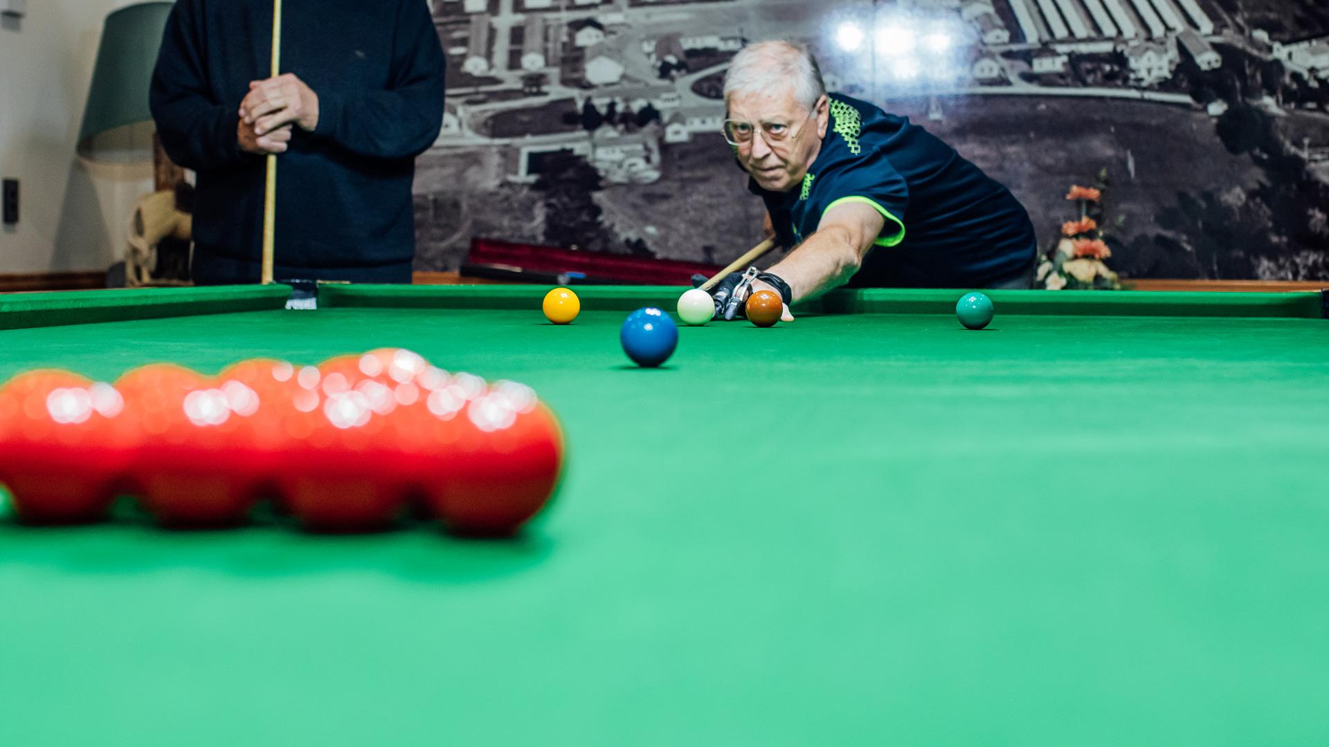 Man Playing Billiards